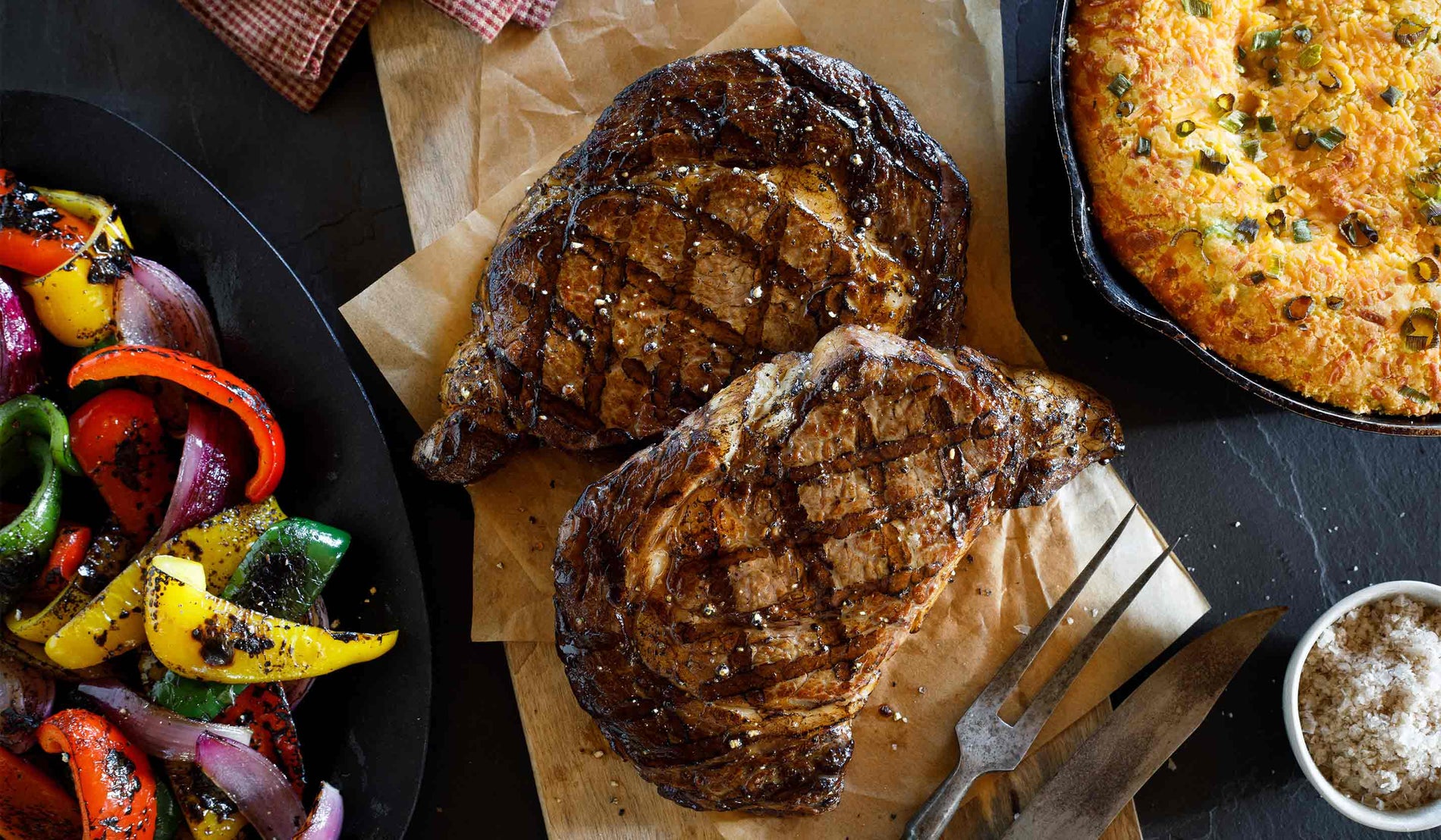 Grilled Boneless Ribeye Steak with Fajita-Style Sautéed Peppers & Onions