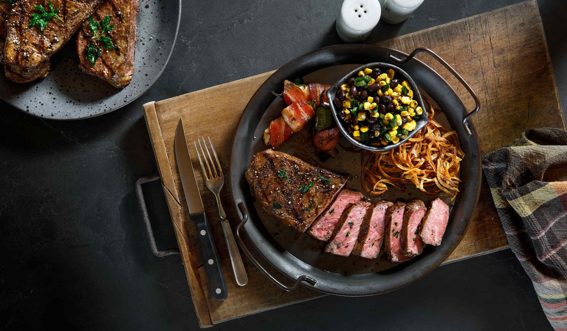 Mesquite Grilled Striploin Steak with Charred Jalapeno Lime Butter